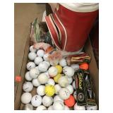 Lot of golf balls & tees.