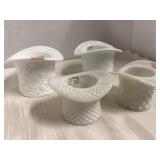 4 milk glass hats. 2 smaller are hobnail.