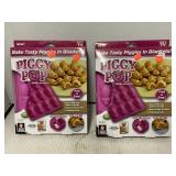 Lot of two Piggy Pop silicone baking pans