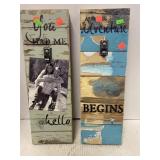 Two decorative plaques with clips