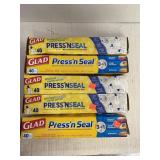 Five boxes Glad press and Seal wrap