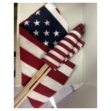 Eleven 12" x 18" stick American flags  plus one