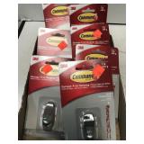 7 pkgs. Command Strips. Holds 1 lb.