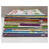 Fourteen Scholastic Workbooks.  Various subjects
