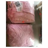 Pink sheer curtains.