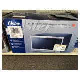 Oster 1.1 Cu.Ft. Countertop Microwave Oven