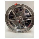 Chrome wheel clock.  12 in diameter