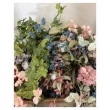 Lot of floral in brass bowls.