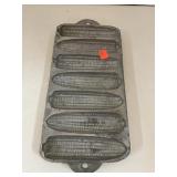 Cast Aluminum. Corn bread / corn pone maker.