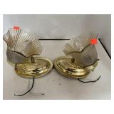 2 wall sconces. Iridescent amber globes.