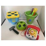 Lot of toys. Incl Fisher Price Telephone.