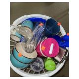 basket of Misc items. Drinkware/ picnic ware.