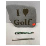Golf stone & 2 pens.