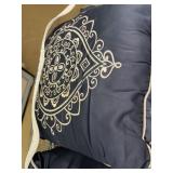 Comforter w/ decorative pillows. Unsure of size.