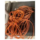 3 Orange Extension Cords.