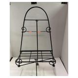 Metal stand w/ shelf. 21.5in tall.