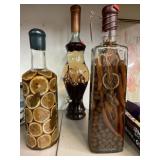 3 decorative jars. Sealed. One has pour