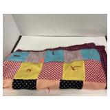 Handmade lap quilt. Polyester squares.