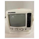 Lot of electric cords & Sylvania  TV / AM/FM