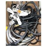 Lot of electronic cords. Nightlight fixtures.