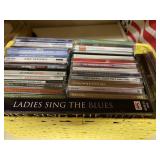 Lot of CDs. Variety of genres. In basket