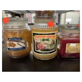 3 jar candles. Two slightly used.