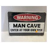 Metal Man Cave Sign