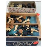 Old wood checkers & chess pieces. Small sign