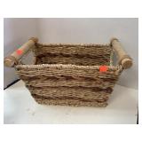 Basket w/ wood handles. 13x8x9in tall.