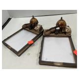 Desk top note paper holders.