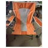 Vented folding camp chair.