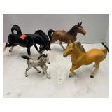 Lot of 4 Horse Figurines.