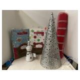 Lot of sparkly Christmas items. Tree lights up.