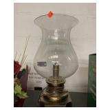 Brass lamp w/ globe.  Small chip in globe. 17.5in