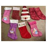Lot of stockings & mini tree skirt.