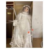 Porcelain bride doll. 20in tall.