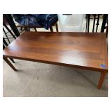 Wood coffee table.  53.5x 25x 15.5in