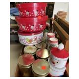Lots of tins for cookies. Christmas themed cups.