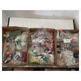3 boxes of costume jewelry.