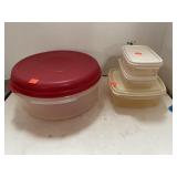 Rubbermaid storage containers w/ lids.