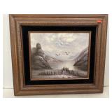 Painted canvas picture.  Mountains & water scene.