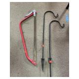 Tree saw & 2 yard / shepherds hooks.