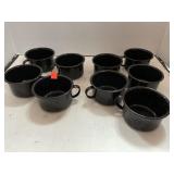 9 Granite ware mugs.