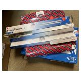 Office supplies.  File folders & prong fasteners.