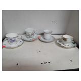 4 Teacups & Saucers.