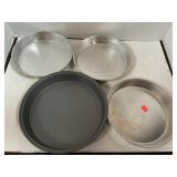 4 round cake pans. 3 mirro - 8in.  1 - 9.5in