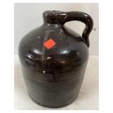 Brown pottery jug / crock jug.  10in high approx.