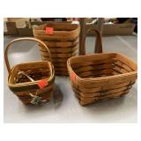 3 Longaberger baskets. 1 w/ lucky clover