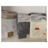 3 table cloths.  Basket Weave 60in round.2