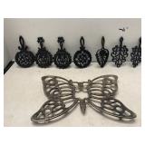 Lot of 7 Cast Iron Trivets plus One Large Trivet